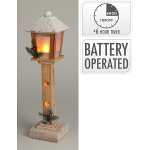 Dekoratívna LED lampa v prírodnom vzhľade so snežným povrchom, výška 52 cm, pre atmosférickú vianočnú dekoráciu.