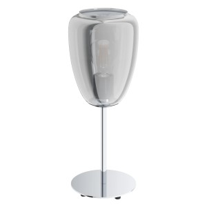Moderná nočná lampa s priehľadným skleneným tienidlom a chrómovou základňou.