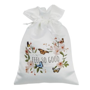 Biely darčekový sáčok s kvetinovým a motýlím vzorom, nápis "Feel so good".
