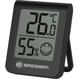 Sada 3 ks BRESSER termo-vlhkomerov, čierny, zobrazuje teplotu 26°C a vlhkosť 55% so smajlíkom.