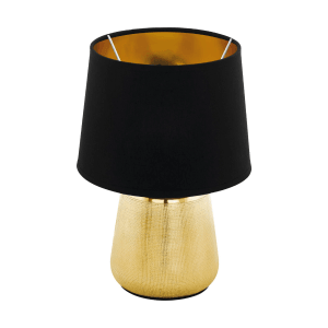Nočná lampa s čiernym tienidlom a zlatou základňou.