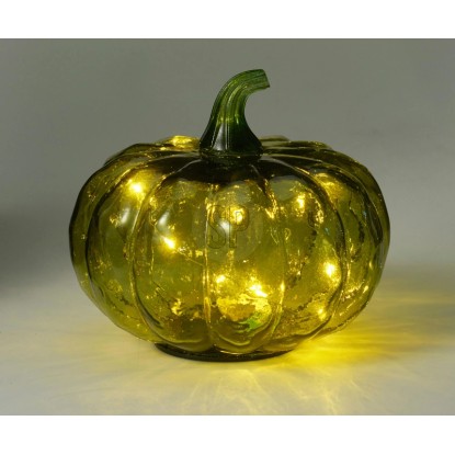 Zelená sklenená tekvicová lampa s teplými LED. Dekoratívna figúrka pre jesennú a halloweensku atmosféru.