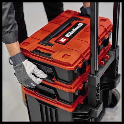 Einhell E-Case L systémový kufor na náradie s kolieskami, červeno-čierny, naskladaný na vozíku. Kufor na náradie na prepravu.